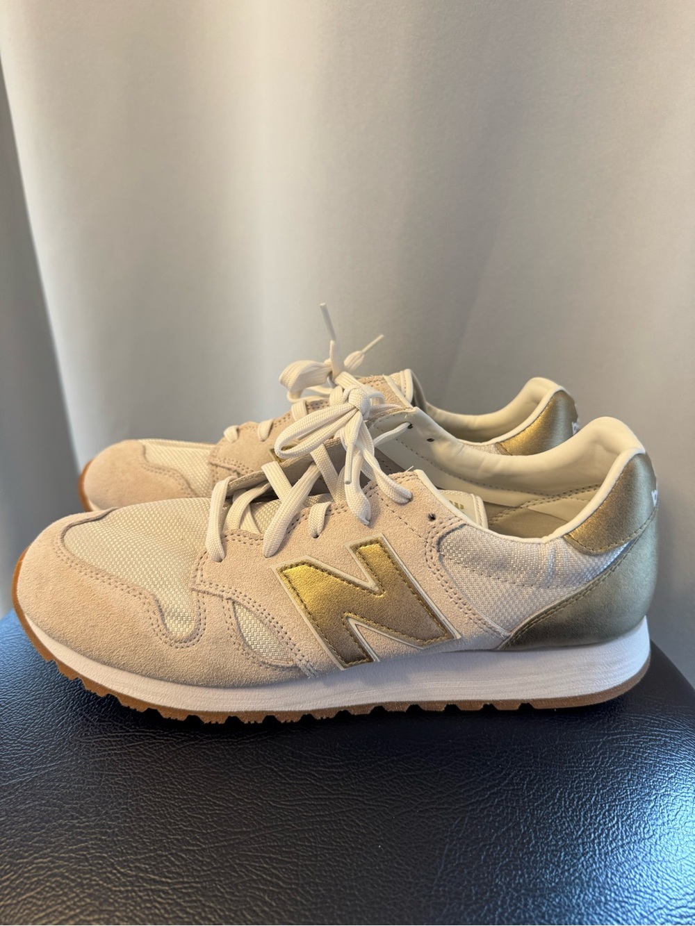 New Balance 520 Sneakers in Beige with Gold Accents